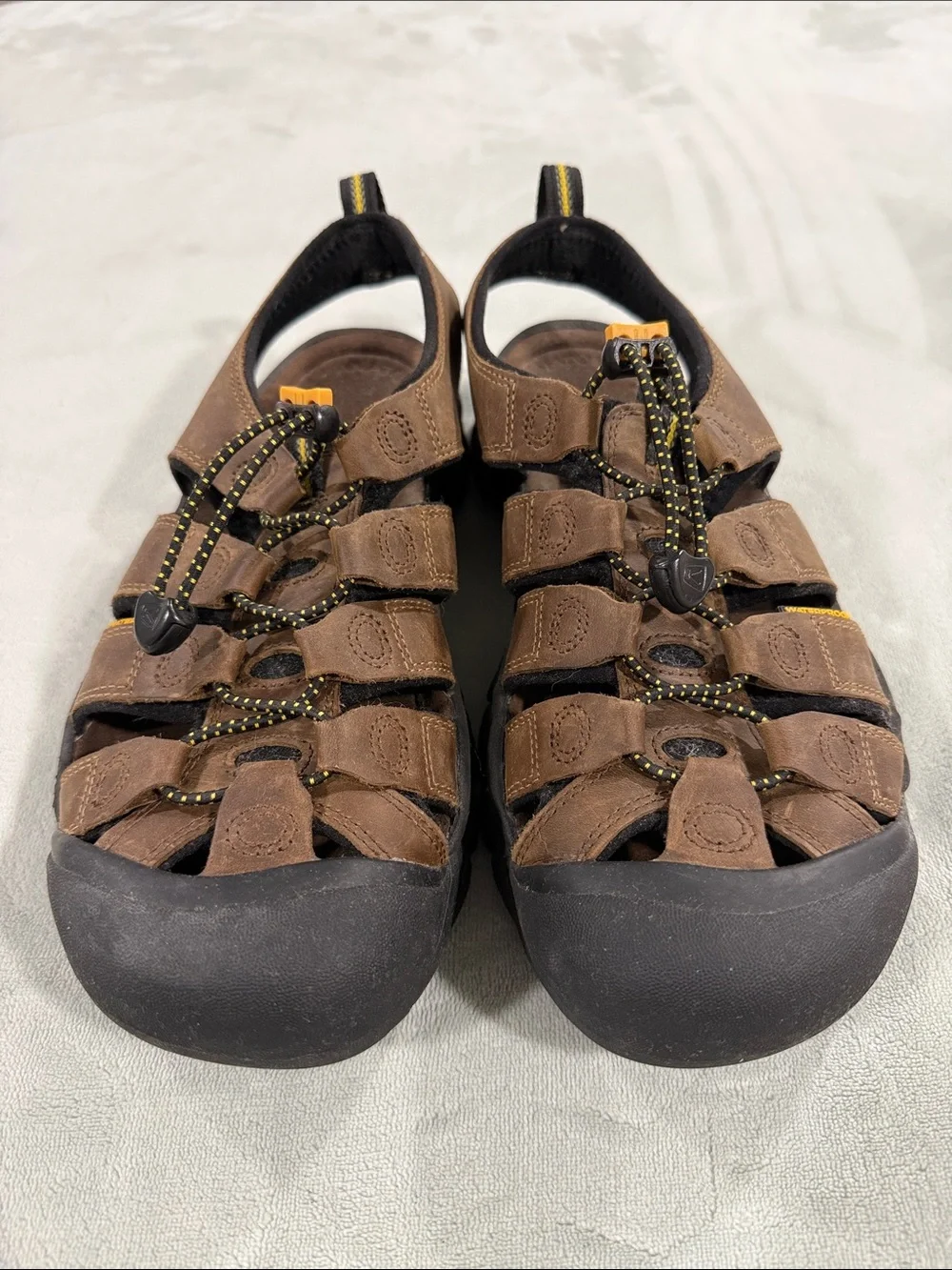 KEEN Brown and Black Men’s Closed-Toe Sandals with Yellow Accents. Never worn.
